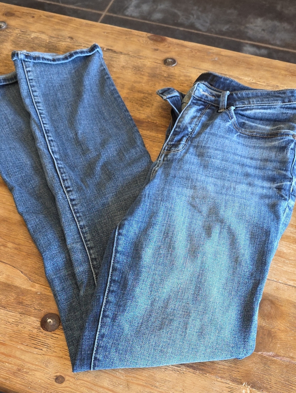 Buckle black skinny jeans